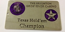 A metal card, surface etched in brass and supplied to the Grosvenor Casino. This brass card was surface etched using the photo etching / chemical milling process, and in-filled with paint.