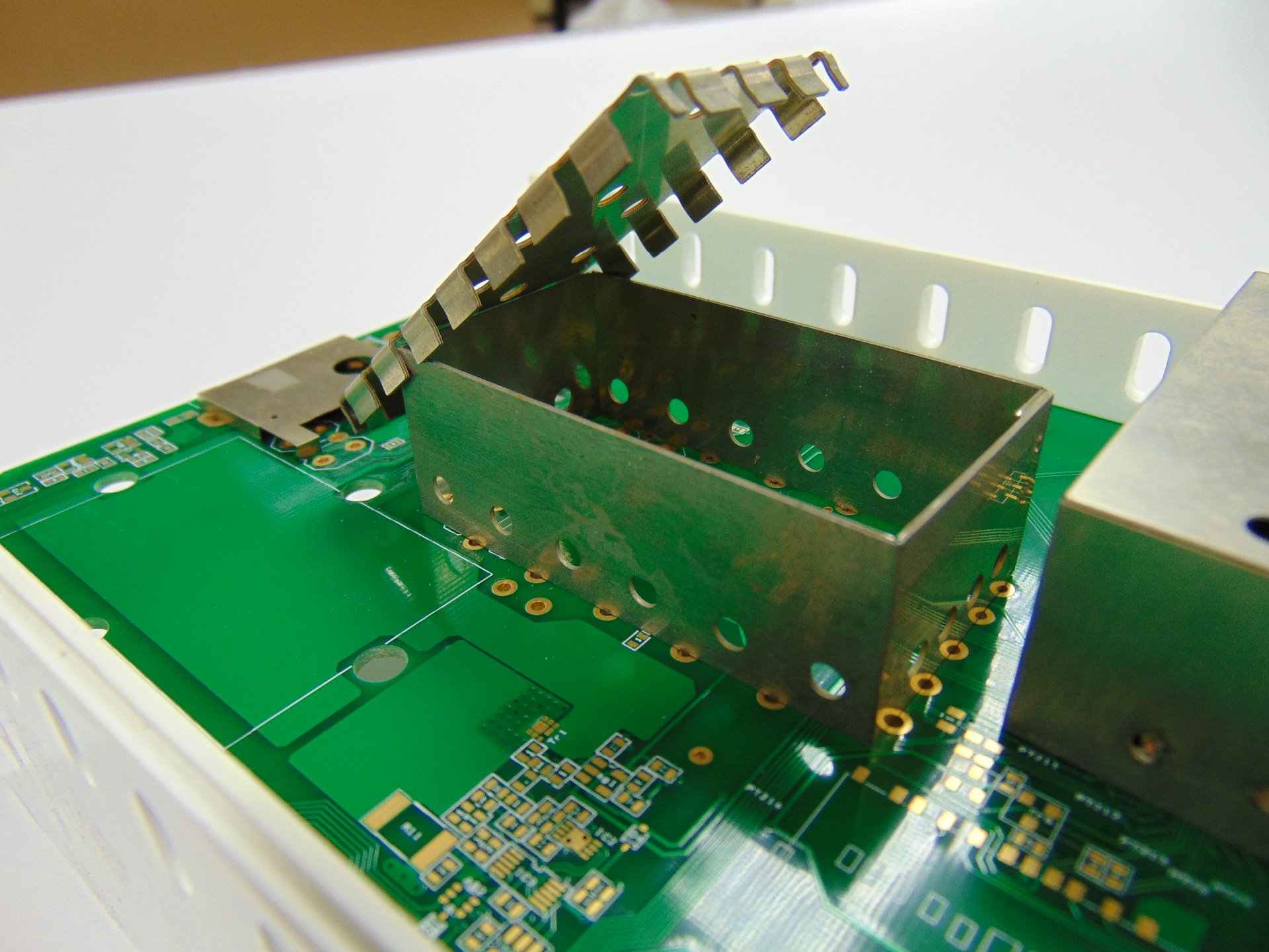 RFI / EMI Shielding manufactured for suppression of electromechanical waves manufactured through Chemical Milling.