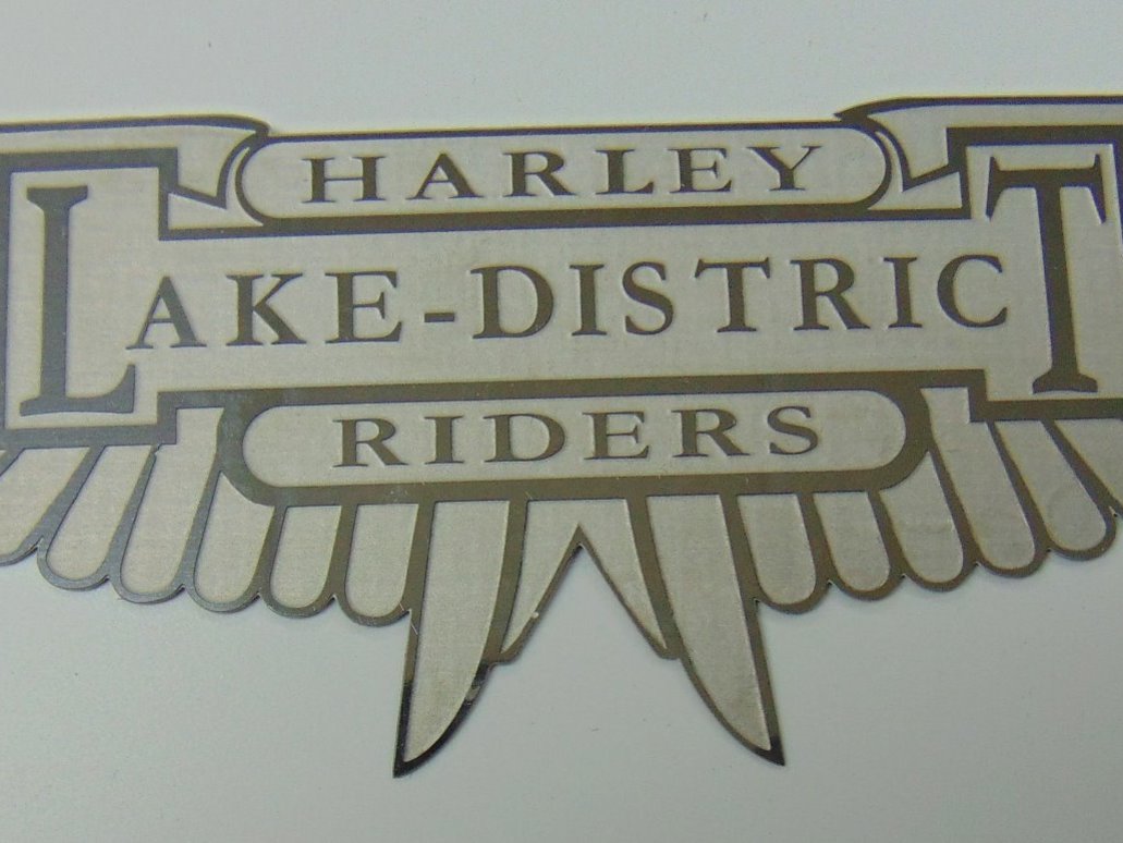 set of Harley wing chemically surface etched made for a club to give out as prizes, all manufactured through Chemical Milling.